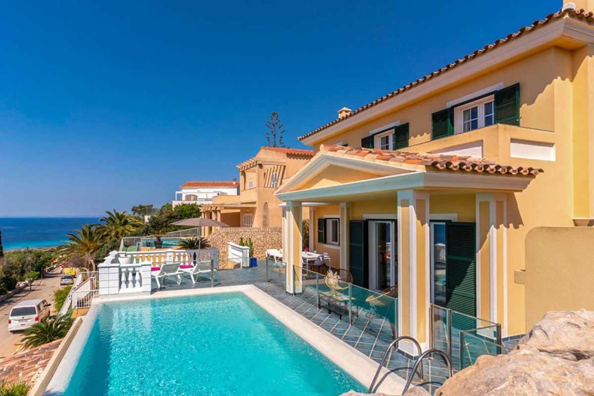 Discover Casa Migjorn, a stunning villa with breathtaking ocean views, stylish interiors, and a beautiful infinity pool.